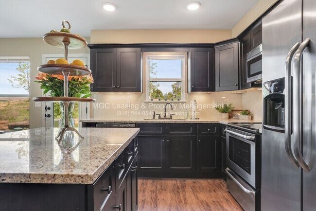 Building Photo - Beautiful Serrano Townhome with FULLY FINISHED Walk-out Basement