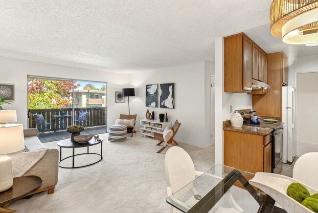 Building Photo - Modern 2-Bedroom Condo with Pool and Koi Pond Views