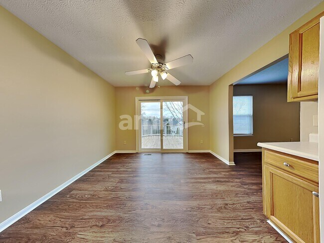 Building Photo - 6312 Satin Wood Dr