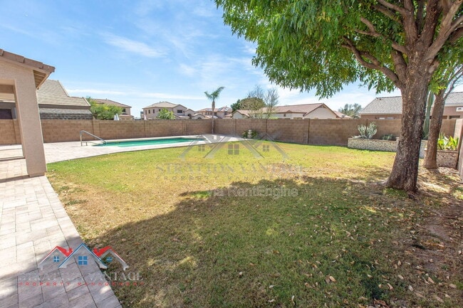 Building Photo - 14099 W Riviera Dr