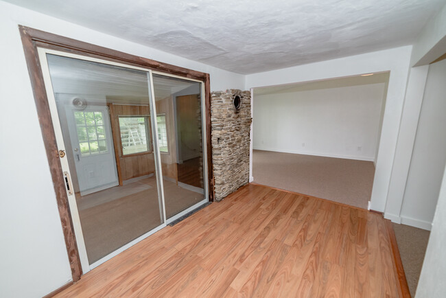 Multi-purpose room opens to mudroom and living room - 22 Muckey Rd