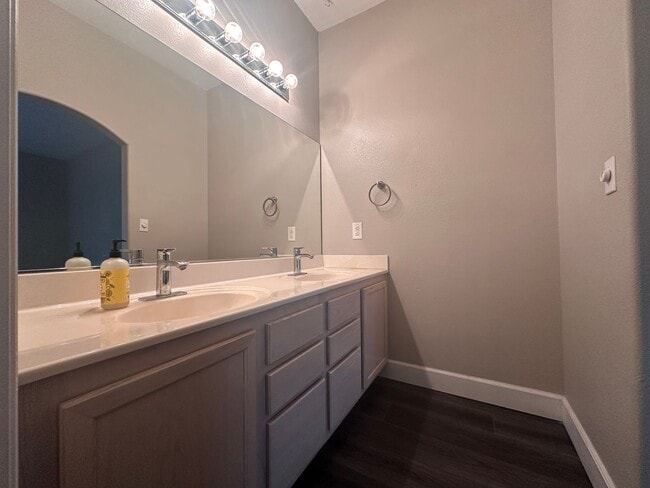 Building Photo - Beautifully remodeled first floor condo with attached 2 car garage!