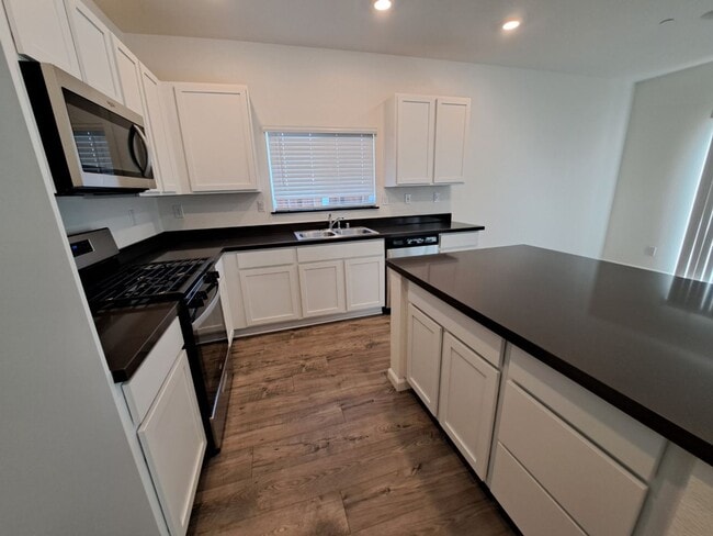 Building Photo - This Smart Home in Dixon is Luxurious with...