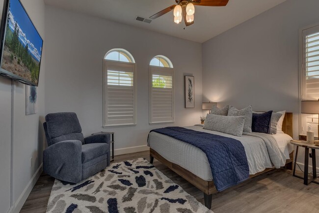 Ground floor queen bedroom with adjacent full bath with walk-in shower - 1698 Gemtown Dr