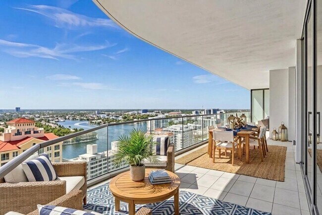Building Photo - Stunning High-Rise Condo with Ocean Views | Prime Beach Location