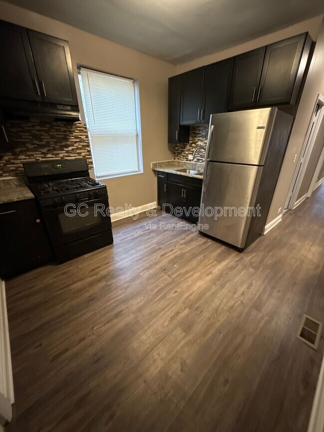 Building Photo - 7323 S Yates Blvd