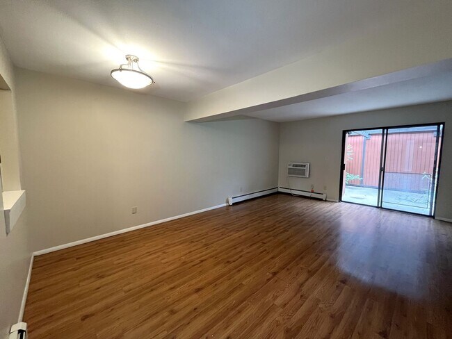 Building Photo - Bright 3BR Condo in Central Fort Collins with Parking| $300 Off First Month