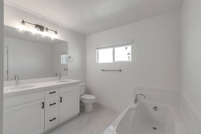 Building Photo - Modern 3-Bedroom, 2.5-Bathroom Townhome Near Highway 6 and I-15 - END UNIT