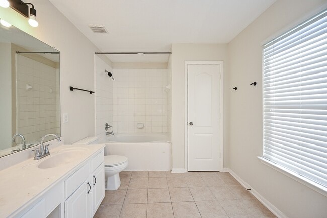 Building Photo - 9403 Coatsworth Dr