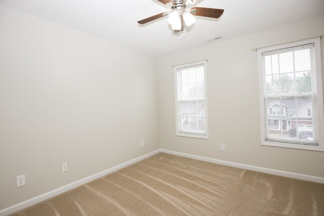 Building Photo - "Charming 4-Bedroom Home with Granite Coun...