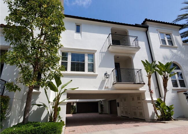 Building Photo - Beautifully Remodel Townhouse with AC & Two Car Garage!