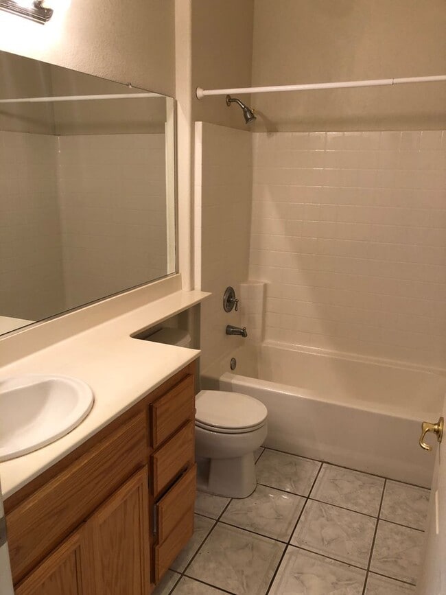 Building Photo - Cute one story in a 55 or better gated community.