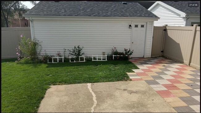 backyar with detached garage view - 111 41st St