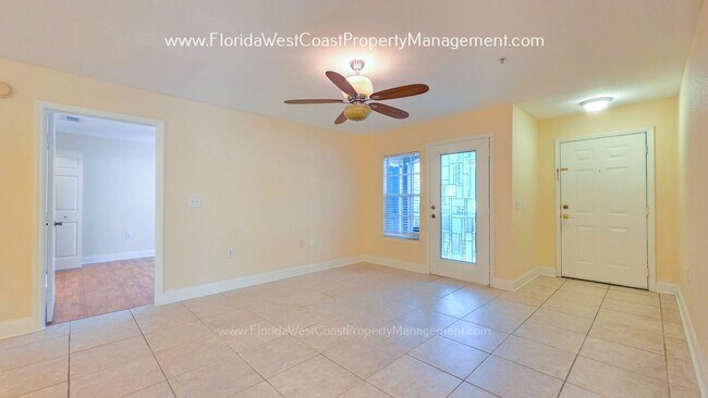 Building Photo - MOVE IN READY! LARGE 2 BEDROOM/2 BATH PLUS ATTACHED GARAGE! TILE/LVP THROUGHOUT!