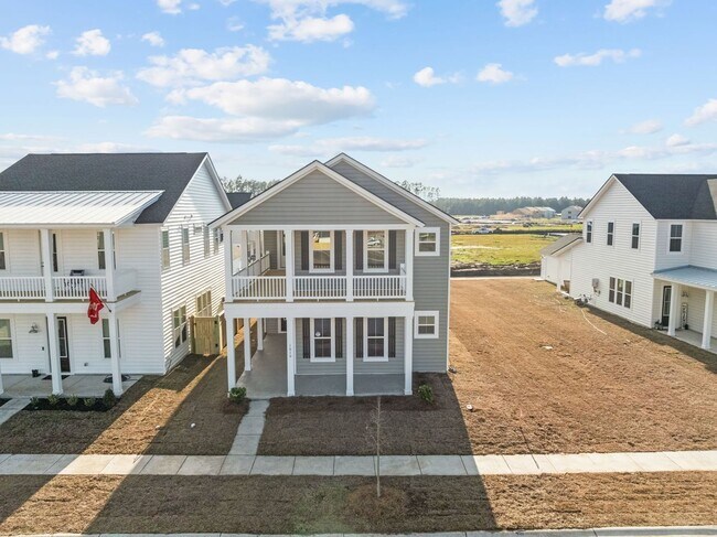 Building Photo - This brand-new home makes a statement from the moment you arrive!