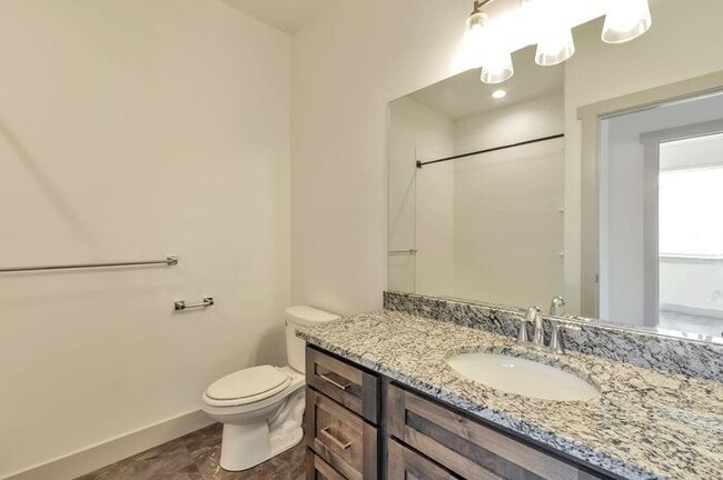 Building Photo - Modern End Unit townhouse w attached 2 car...