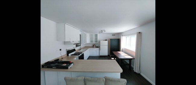 View with the front door open facing end - 14715 Addison St