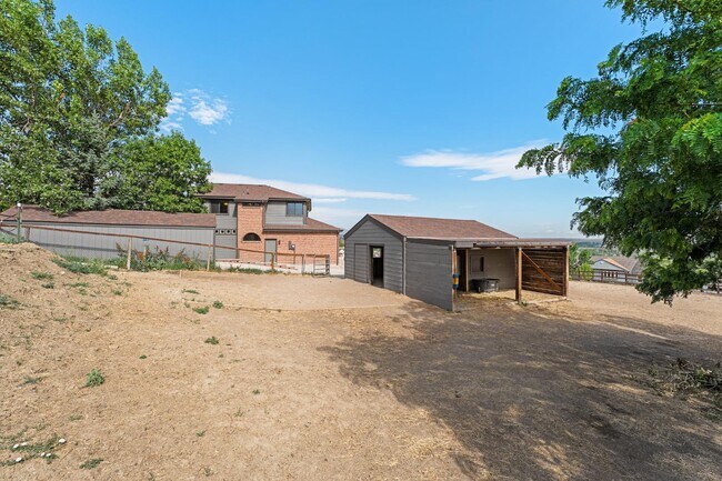 Building Photo - 12540 W 86th Ave