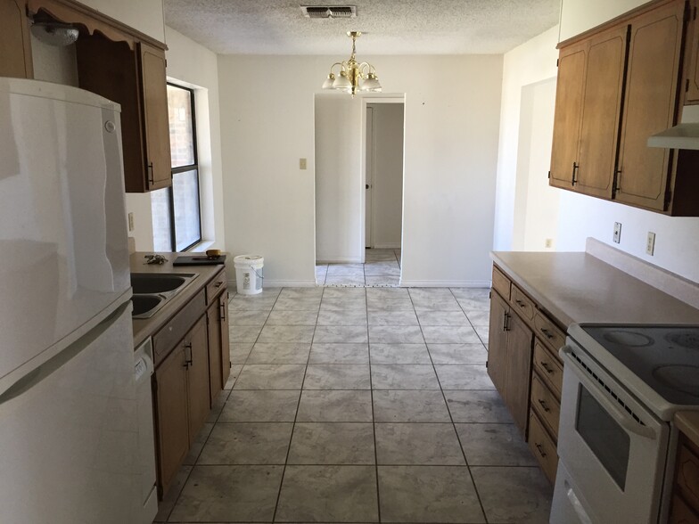 Kitchen, dining room (prior to repaint) - 613 Van Zandt St