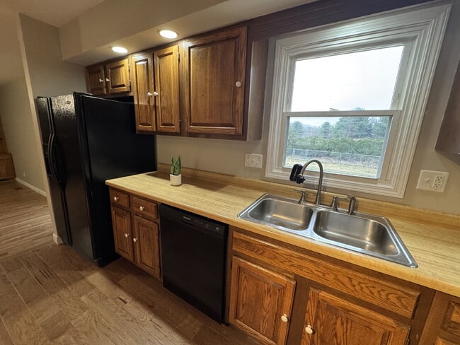 Building Photo - “Spread Out!” — 3 Bed Home with Sun Room + Multiple Living Spaces