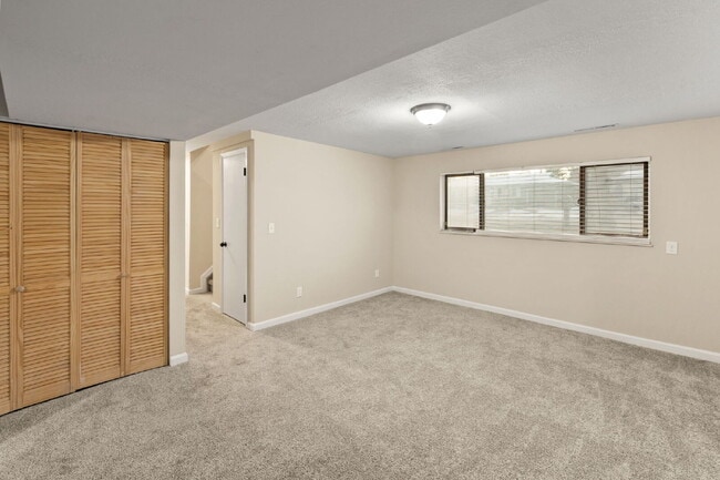 Building Photo - Spacious Split-Level Home with Finished Basement, Deck, Fenced Yard & 2-Car Garage