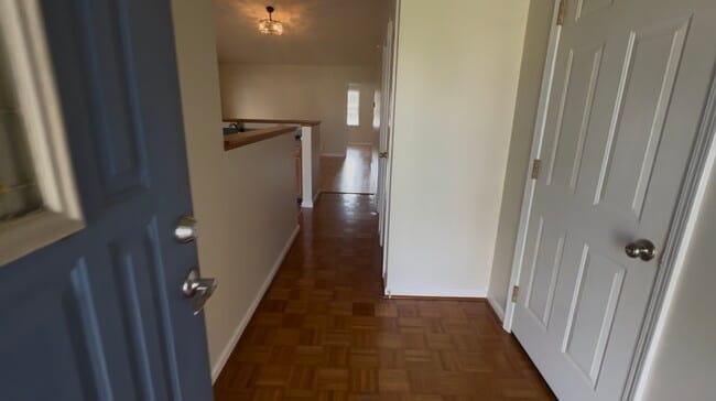 Entrance; garage door to right - 1016 Champion Dr