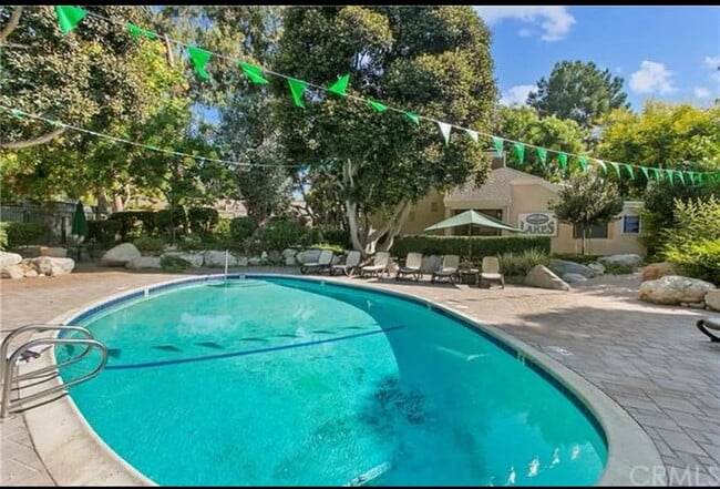Building Photo - "Chic & Cozy 1-Bedroom Furnished Gem with ...