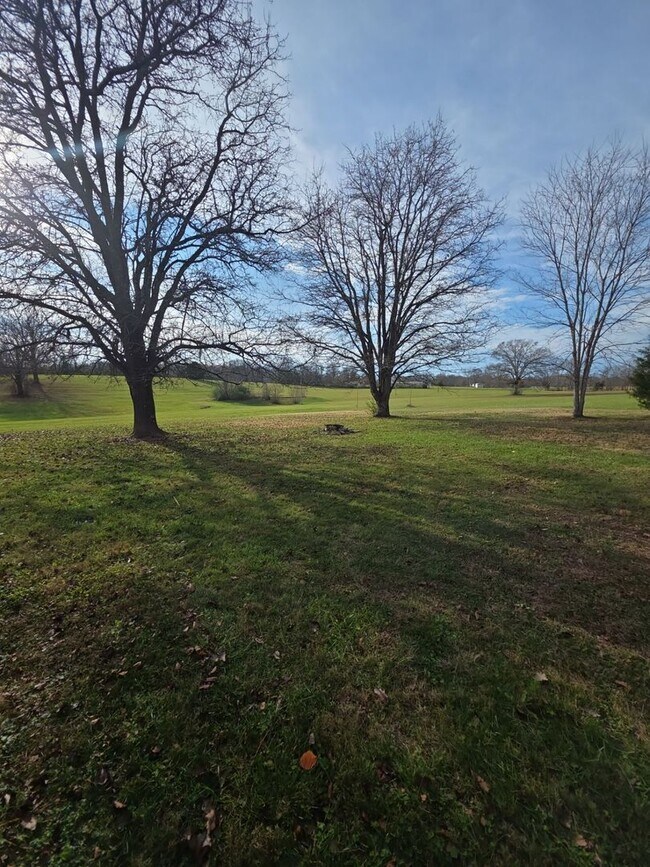 Building Photo - 2-Bedroom Handicap-Accessible Home with 3-Season Porch, Garage, and Large Yard
