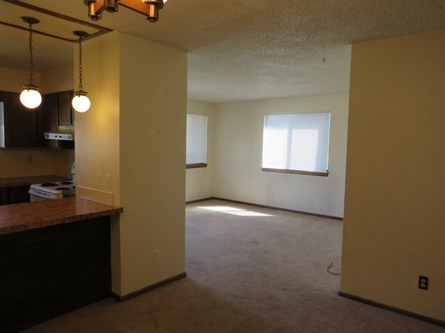 Building Photo - 3 bedroom Ranch Style Duplex backing to open space.