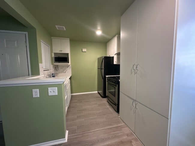 Building Photo - 10233 De Soto Ave