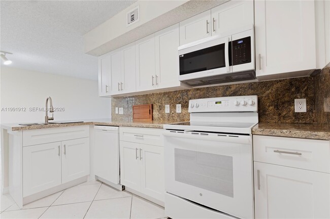 Building Photo - 9615 NW 1st Ct