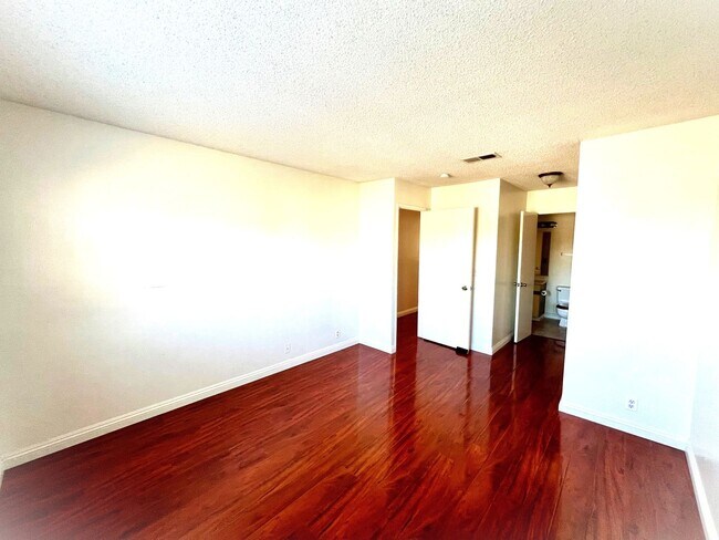 Building Photo - 2-Bedroom, 2-Bath Upstairs Condo Unit in Gated Pomona Community, Water/Trash/HOA Included!