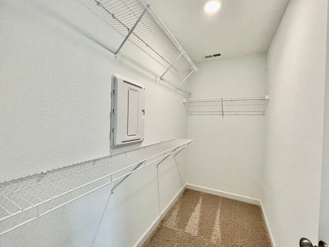 Building Photo - Practically New & Available NOW! Americana Luxury Townhomes! Pet Friendly! Attached Garage! All A...