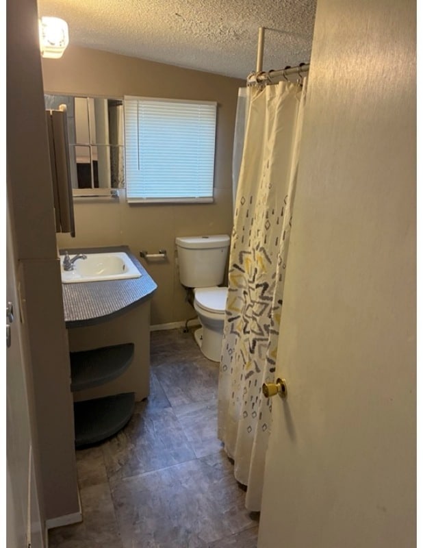 Building Photo - 1030 W 14th Ave