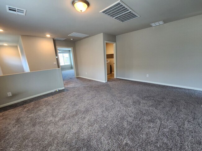 Building Photo - A Fairly New Home with 5 Bedrooms in a gated community