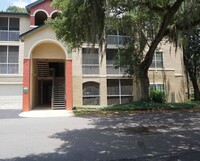 Building Photo - Ground floor 2 bedroom condo in gated Pont...