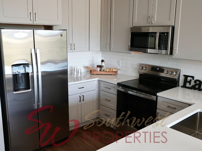 Building Photo - FULLY FURNISHED, close to campus 3 bedroom 2.5 bath Cowboy Casita!