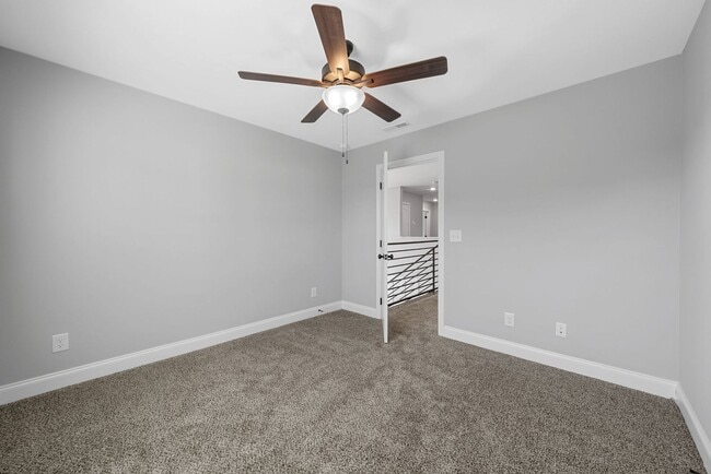 Building Photo - Pet Friendly Four Bedroom with Bonus!