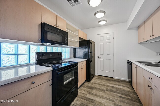 Building Photo - 3065 N 67th Ave