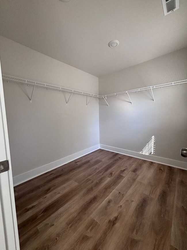 Building Photo - Brand new three-bedroom, 2.5-bath townhome
