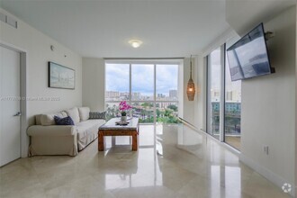 Building Photo - 18201 Collins Ave