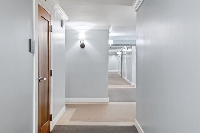 Building Photo - 2BR Condo w/ Covered Parking and Balcony Views at Broadway Towers