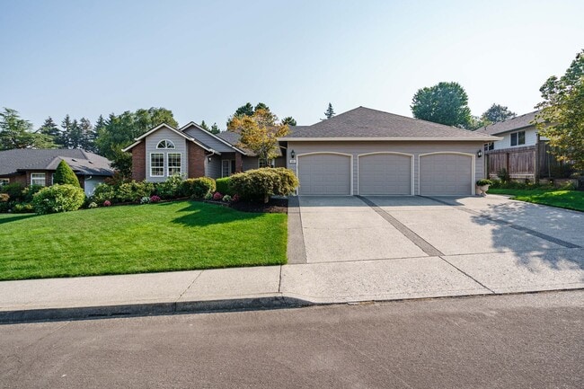 Building Photo - Beautifully Landscaped 1/4 acre with Well Maintained 4 bedroom 2 Bath Home with 3 Car Garage