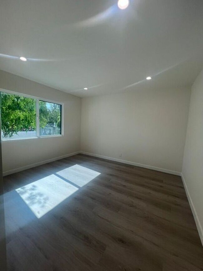 Building Photo - 7317-7321 Garden Grove Avenue