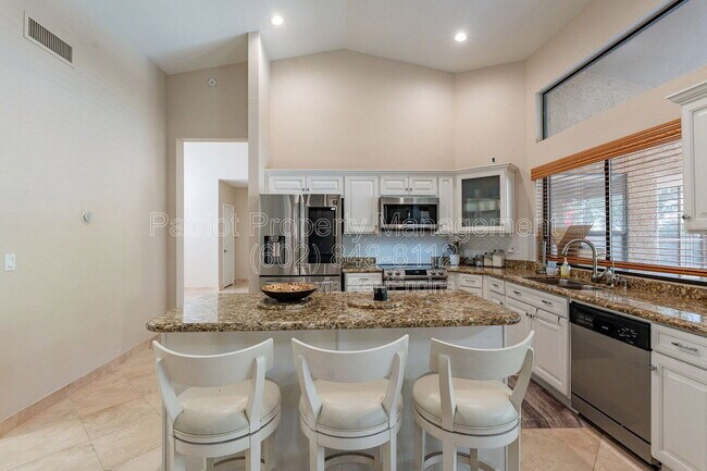 Building Photo - 9910 E Sutton Dr