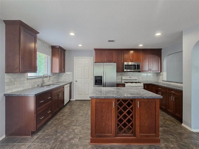 Building Photo - 9511 Woodvale Dr