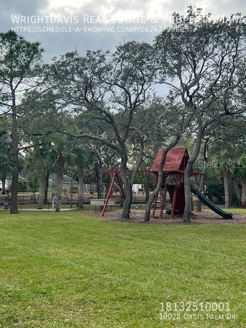 Building Photo - 10028 Oasis Palm Dr