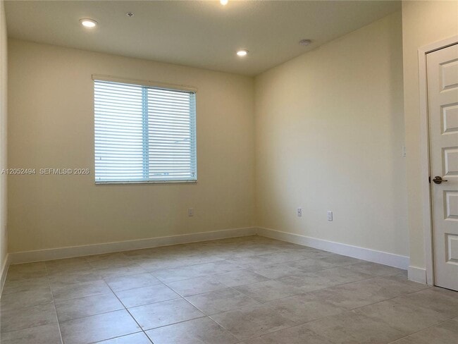 Building Photo - 6455 NW 103rd Pl