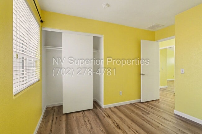 Building Photo - NW!! 4 Bedrooms!!! All Tile and Pergo flooring T/O!! NO Carpet!!! Low Maintenance Desert landscap...