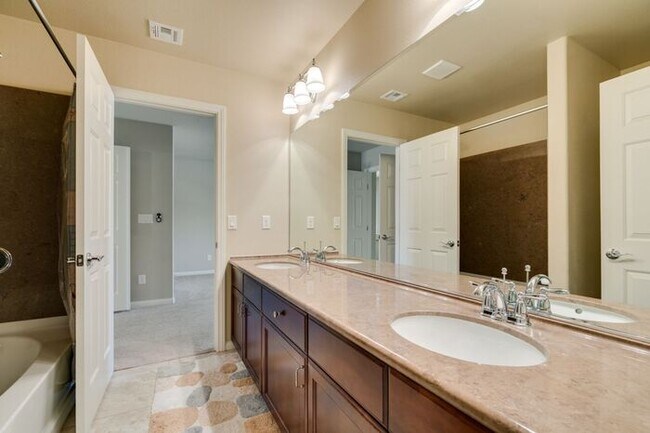 Building Photo - Bright & Spacious 5-Bedroom Home with 3-Car Garage in 89141